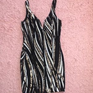 Sexy black/white and gold dress